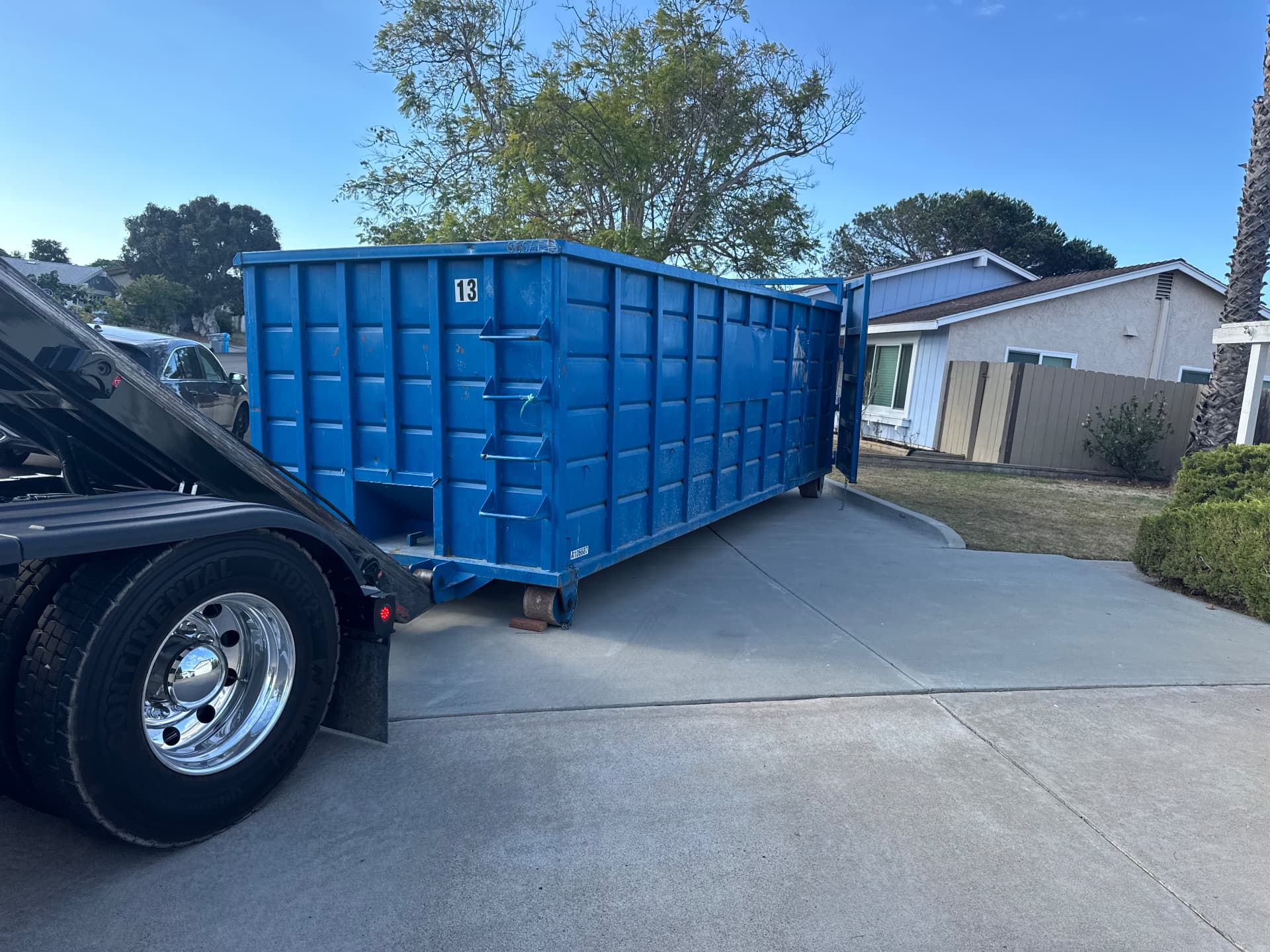 Blue 40-yard dumpster